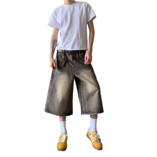 Grey Jorts styled with a white t-shirt and yellow sneakers for a trendy Y2K look