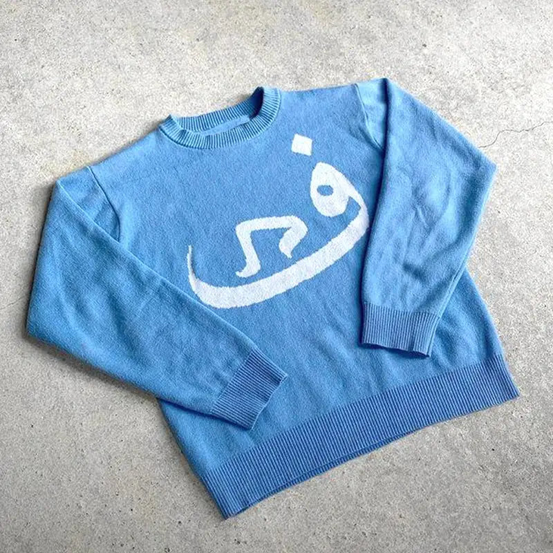 Blue Habibi Sweater with white abstract design, perfect for Y2K style lovers