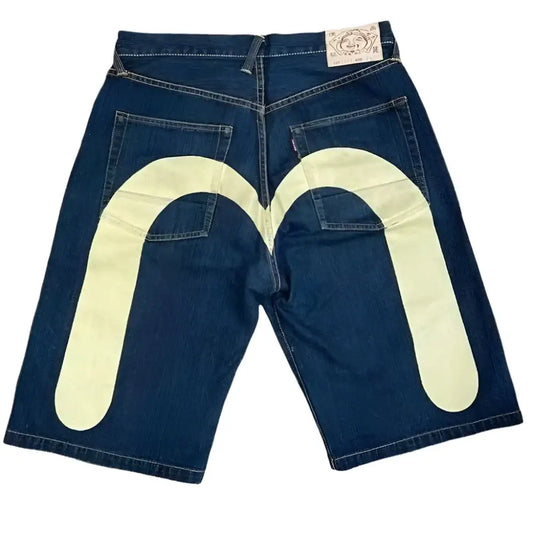 Dark blue Harajuku shorts with yellow M-shaped design on the back for trendy Y2K style