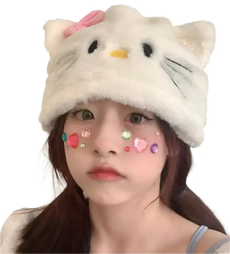 Person in a white plush Hello Kitty beanie with colorful cheek stickers, Y2K style