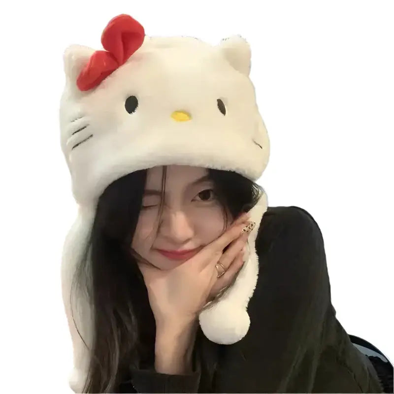 Person wearing a Hello Kitty Beanie made of plush material for a cute Y2K style