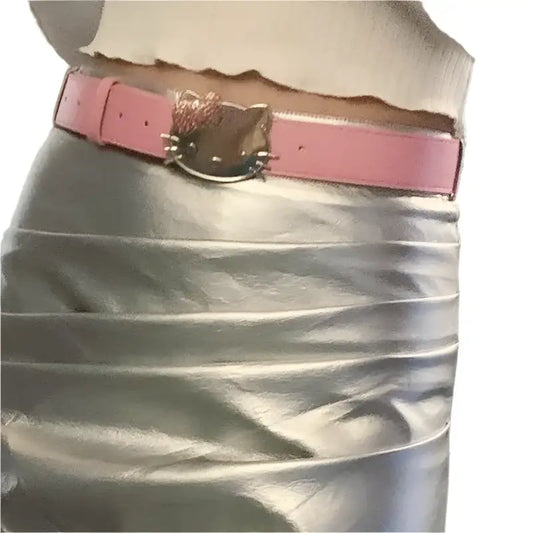 Pink Hello Kitty belt with a bow buckle styled over a white garment, perfect Y2K accessory