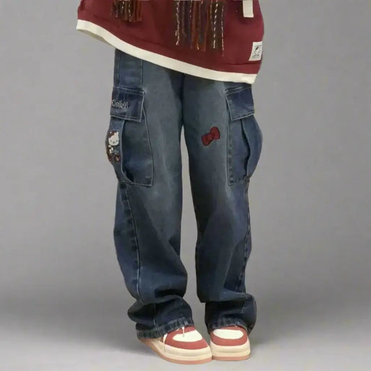 Baggy blue Hello Kitty jeans with cargo pockets, perfect for Y2K style in womens Y2K clothing