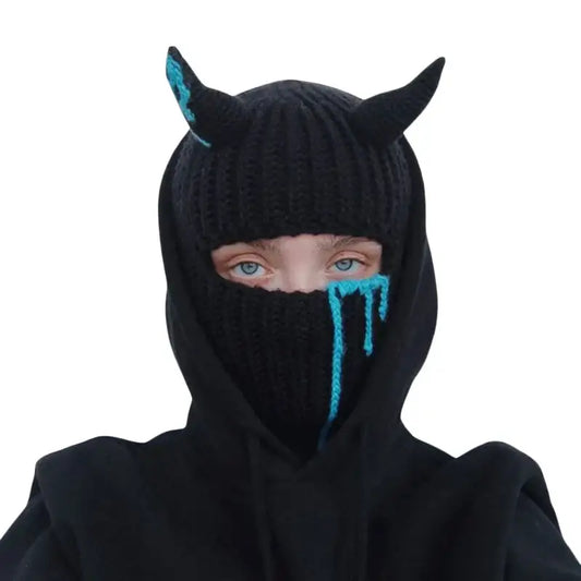 Black Y2K balaclava horn hat with blue horns and dripping detail, showcasing only the eyes