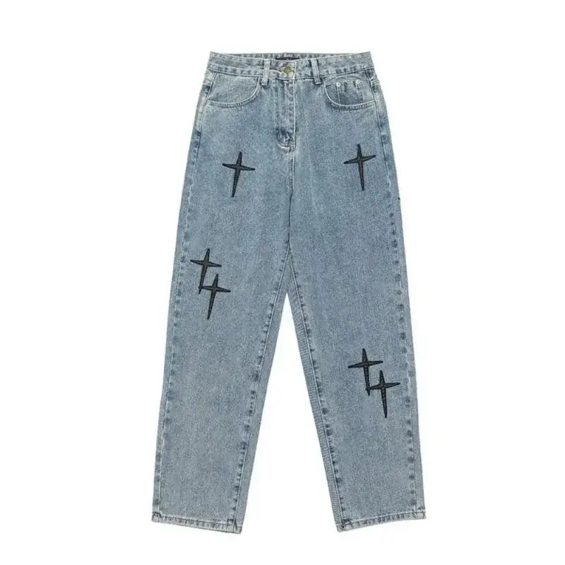 Light blue denim jeans with black cross designs for a Y2K fashion statement