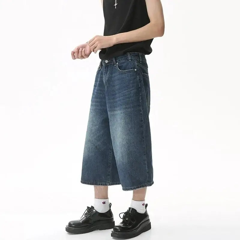 Wide-leg cropped denim jeans styled with black shoes and white socks, Jorts Baggy Y2K