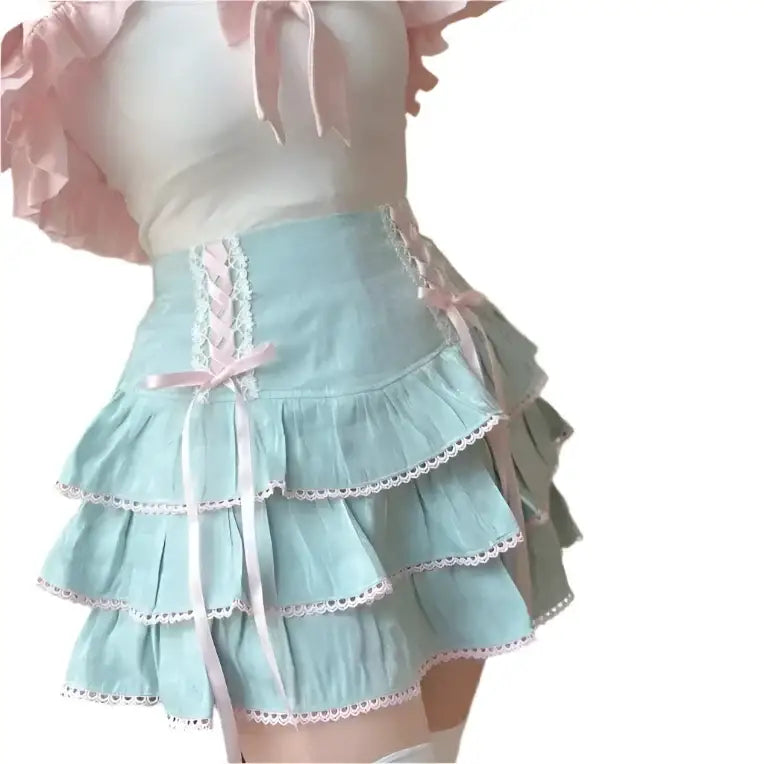 Pastel blue ruffled Kawaii Skirt with pink ribbon accents and white trim for Y2K fashion