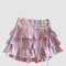 Pink ruffled mini skirt with tiered layers and lace-up details for a cute Y2K look