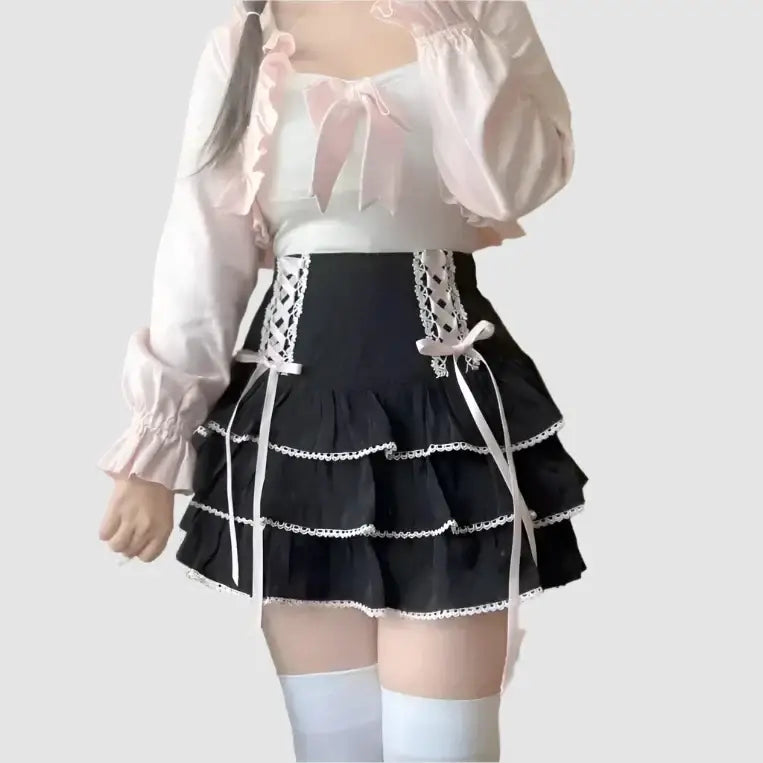 Ruffled black mini skirt with white trim and lace-up sides perfect for a Kawaii Skirt look