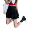 Black ruffled mini skirt with side tie perfect for Y2K style and trendy skirt offers