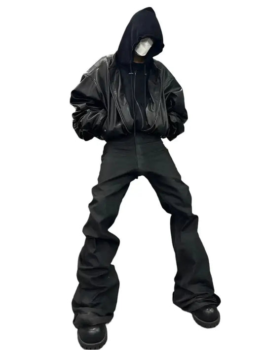 Hooded figure in a dark leather bomber jacket and baggy pants for a stylish look