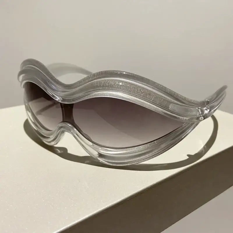 Futuristic Lip Sunglasses with curved frames and gradient lenses, perfect for Y2K style