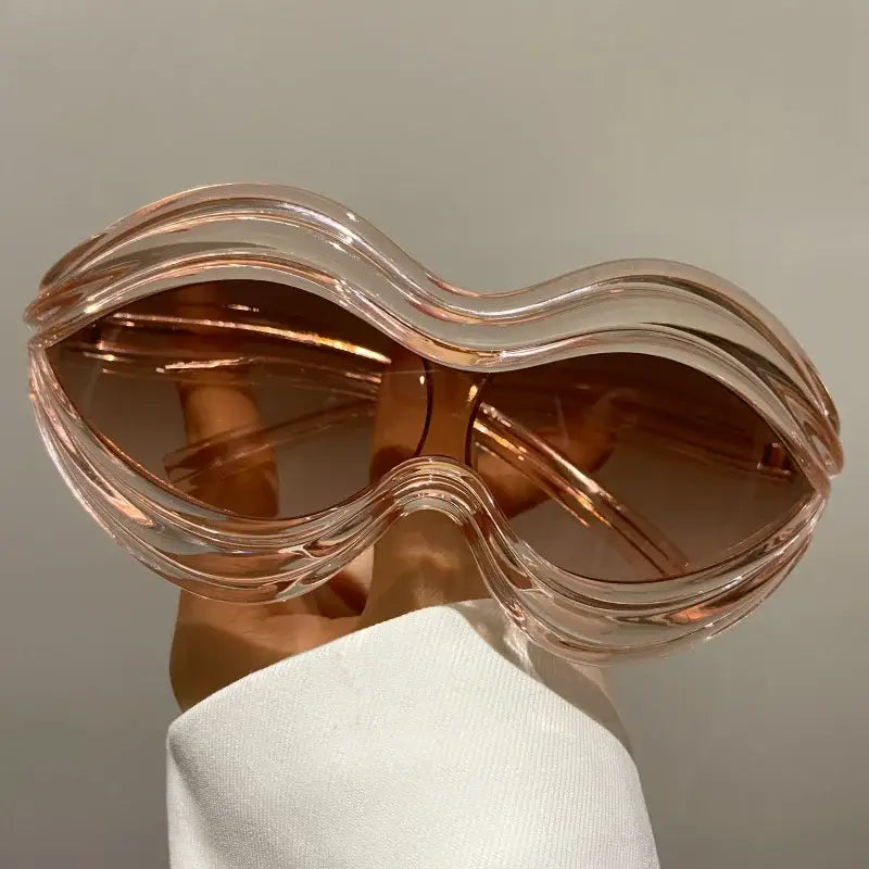 Oversized wavy-framed Lip Sunglasses with gradient brown lenses, perfect Y2K style