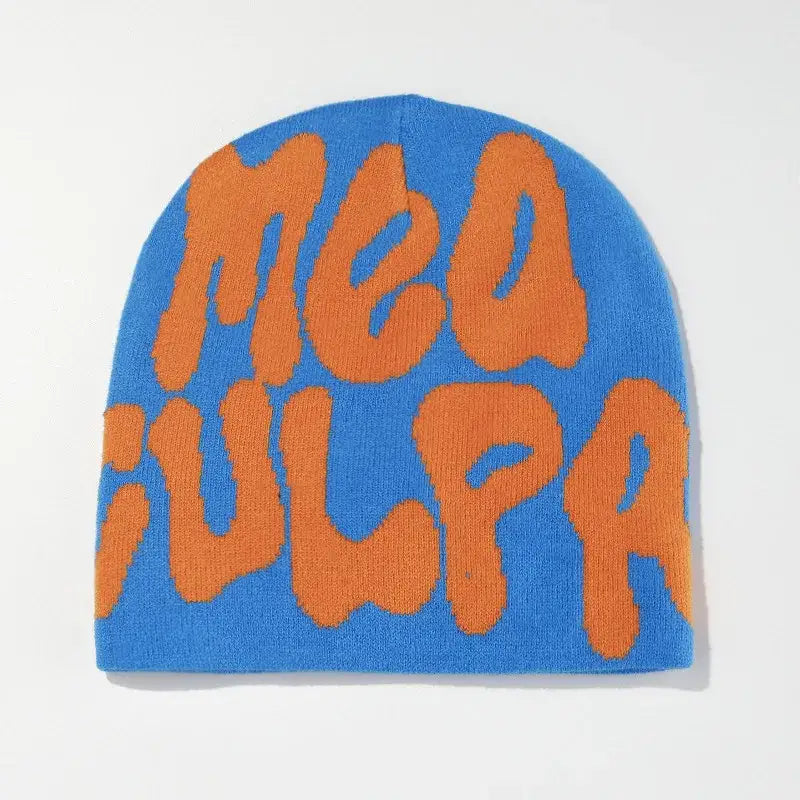 Blue knit Mea Culpa Beanie featuring orange MED VULPA text for stylish warmth