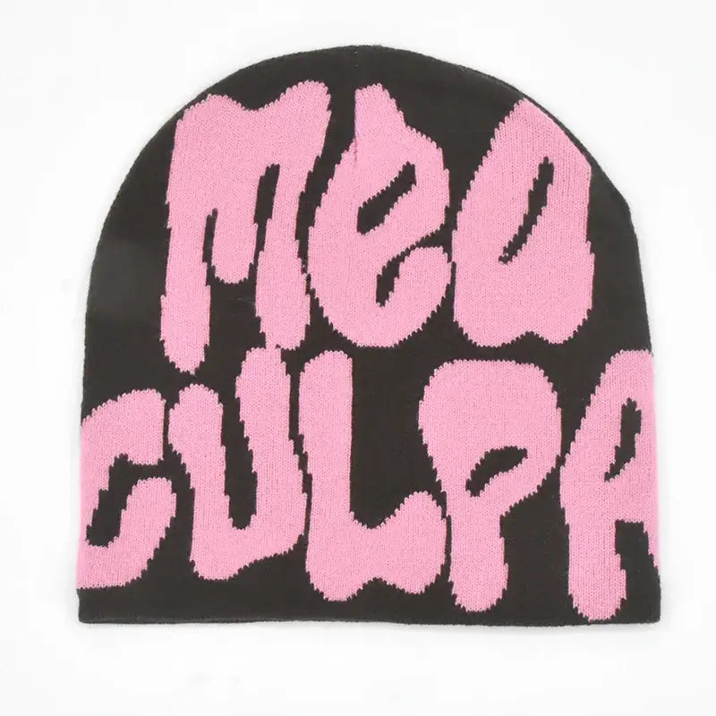 Knit Mea Culpa Beanie with pink text on a stylish black background