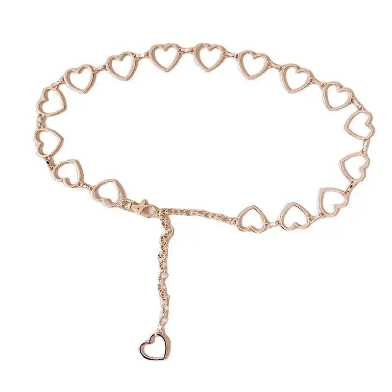 Rose gold heart-shaped chain belt with dangling charm, perfect metal heart belt accessory