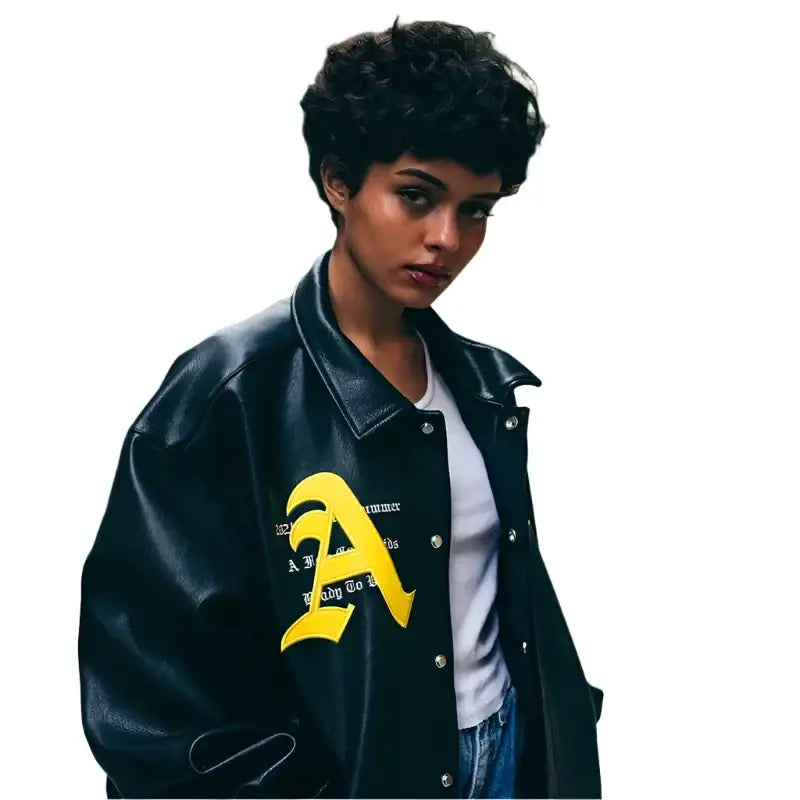 Black leather oversized racing jacket featuring a yellow A logo on the chest