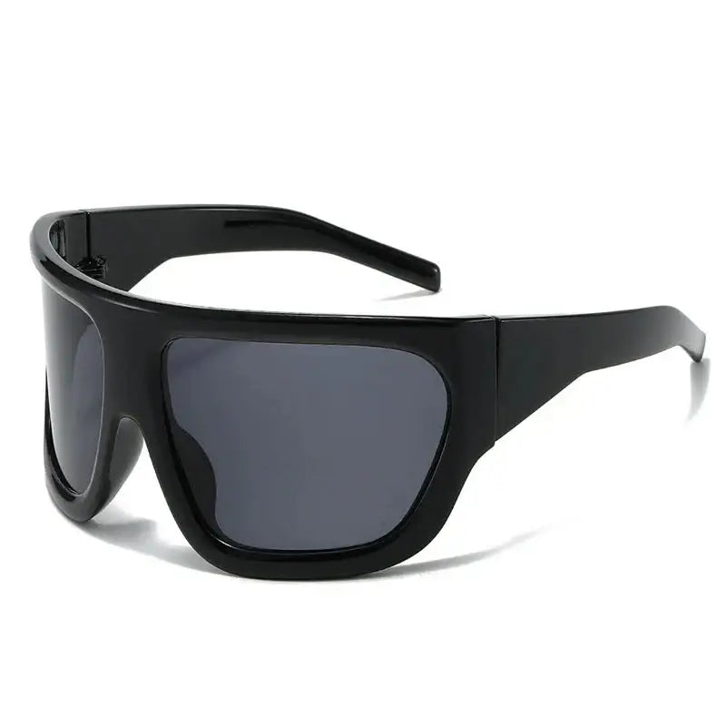 Pair of black oversized sunglasses with dark lenses, stylish Y2K sunglasses for trendy looks