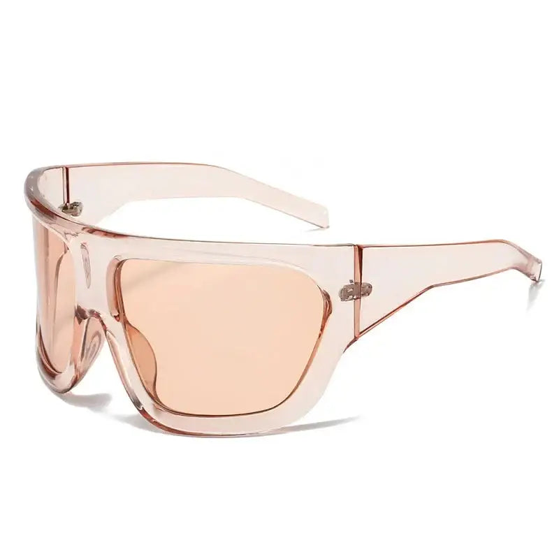 Oversized pink-tinted Y2K sunglasses with a stylish wraparound design