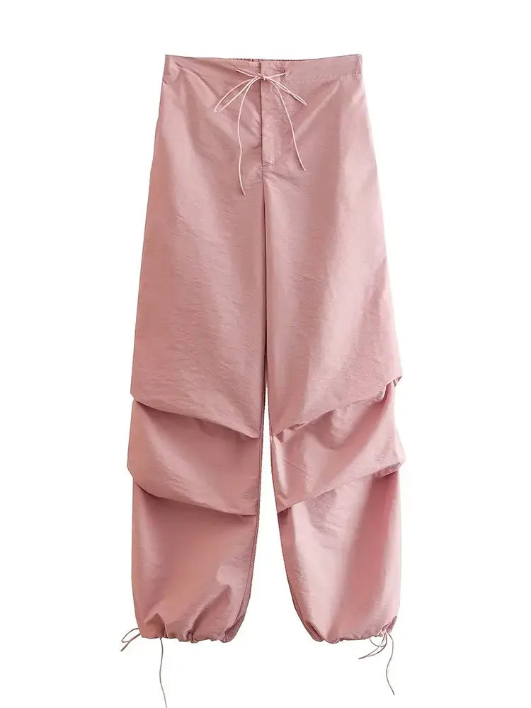 Pink wide-leg Parachute Pants with layered fabric panels and drawstring details, Y2K style