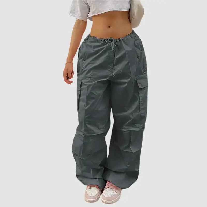 Gray cargo pants with wide legs and multiple pockets, ideal for pairing with pink cargo