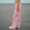 Pink cargo pants featuring a drawstring waist and wide-leg design for stylish comfort