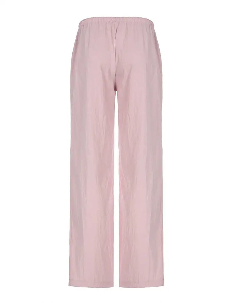 Pale pink wide-leg trousers perfect for comfort and style as pink lounge pants