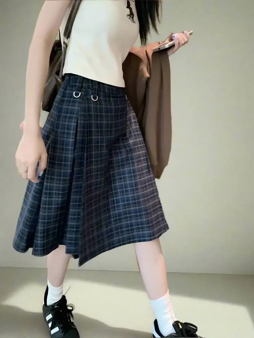 Plaid midi skirt featuring a dark blue and gray pleated pattern for stylish wear