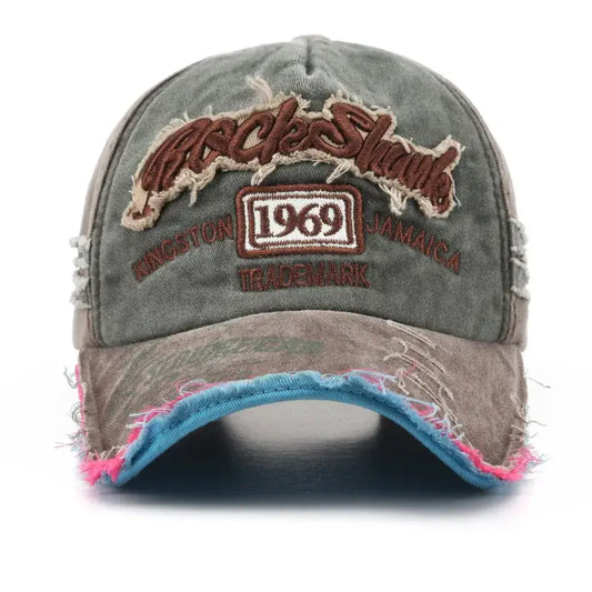 Distressed retro cap featuring 1969 patch and colorful frayed brim edges