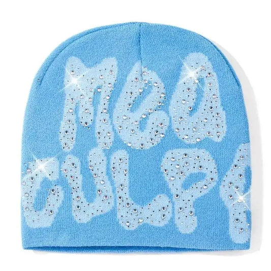 Light blue rhinestone beanie with New Girl written in sparkly lettering y2k fashion statement