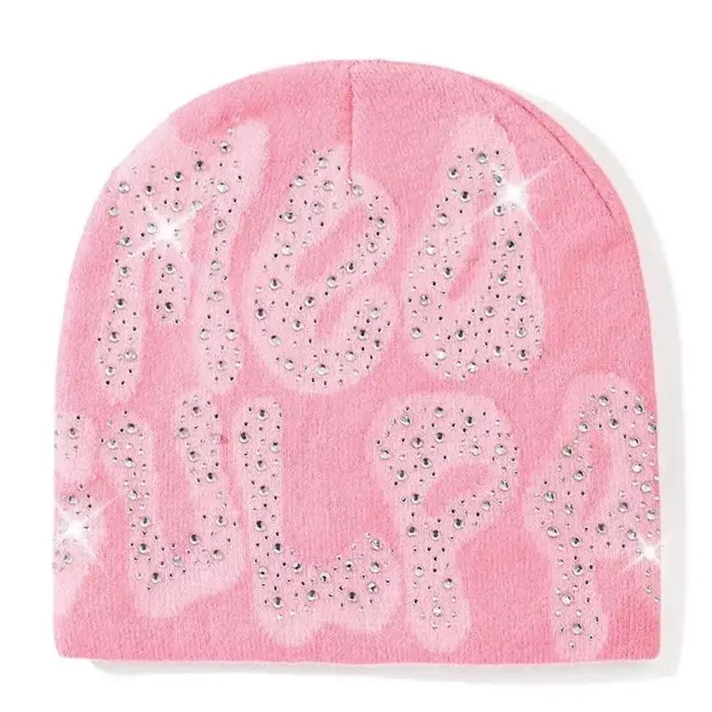 Pink knit rhinestone beanie with sparkly New Year text for the ultimate Y2K fashion statement