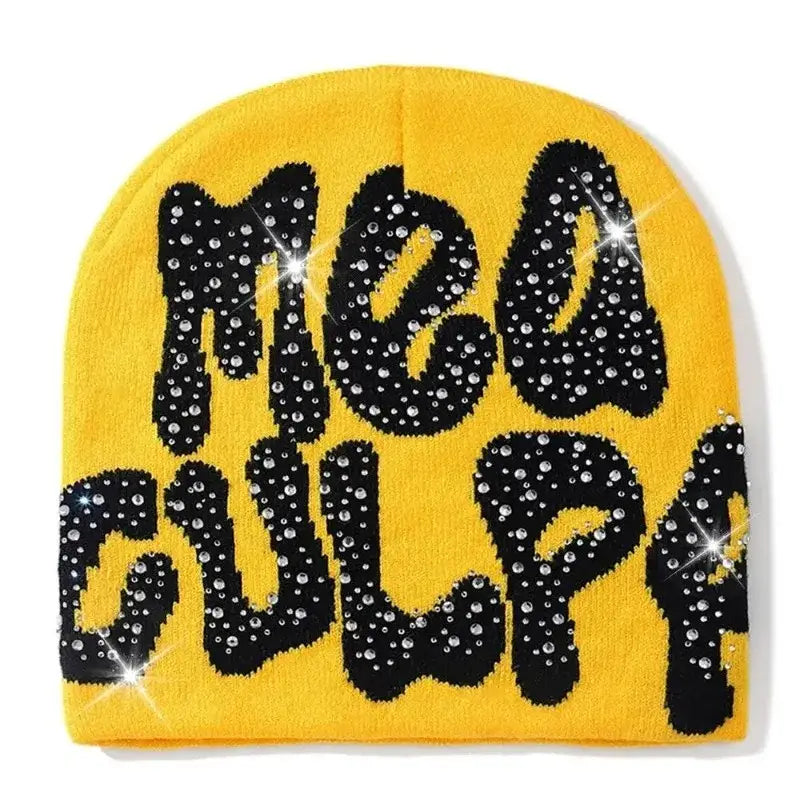 Yellow rhinestone beanie with MBA GULP in sparkly black letters for a Y2K fashion statement