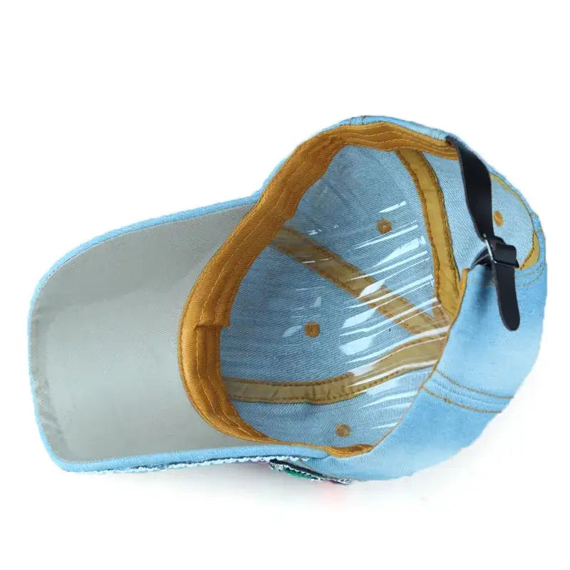 Light blue Rhinestone Cap with yellow brim and strap, perfect for Y2K style lovers