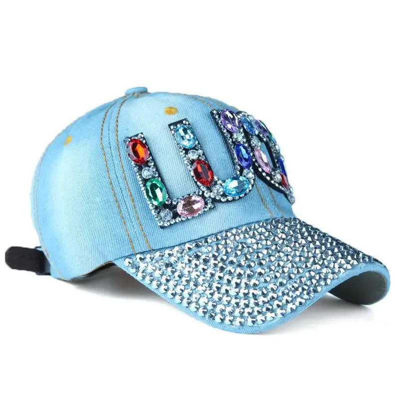 Light blue rhinestone cap with colorful gemstones, perfect for Y2K style enthusiasts