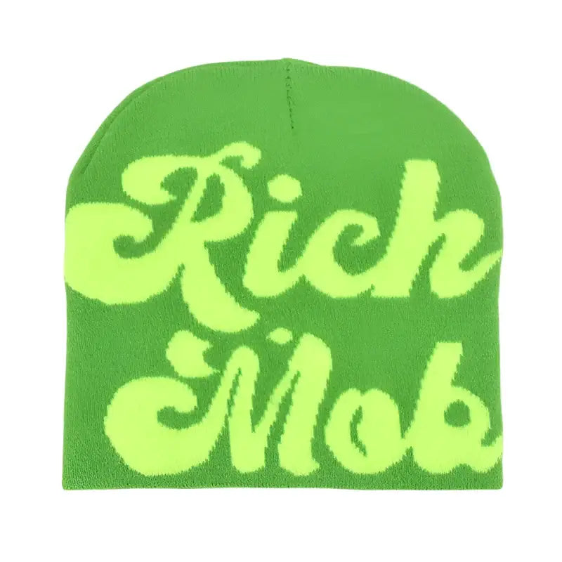 Green knit Rich Mob Beanie with lighter green text for stylish winter wear