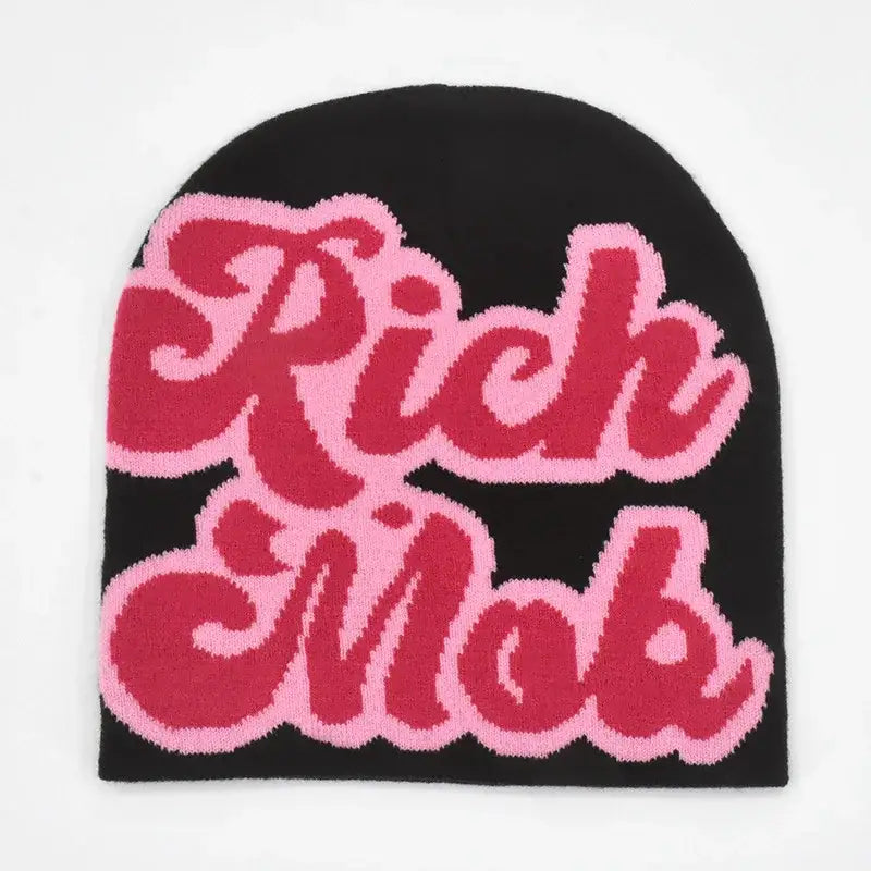 Black knit Rich Mob Beanie featuring bold pink and red ’Rich Mob’ text design