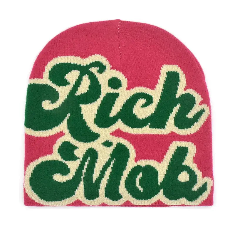 Pink Rich Mob Beanie featuring green and white lettering for a stylish look