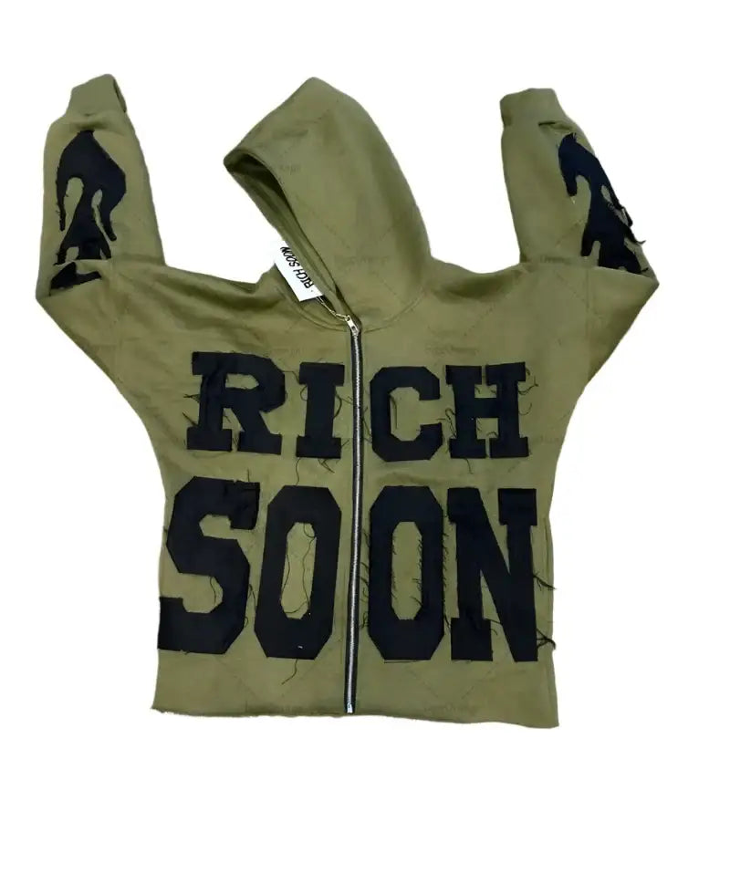 Olive green Y2K hoodie with black RICH SOON print on front, trendy design makes it essential