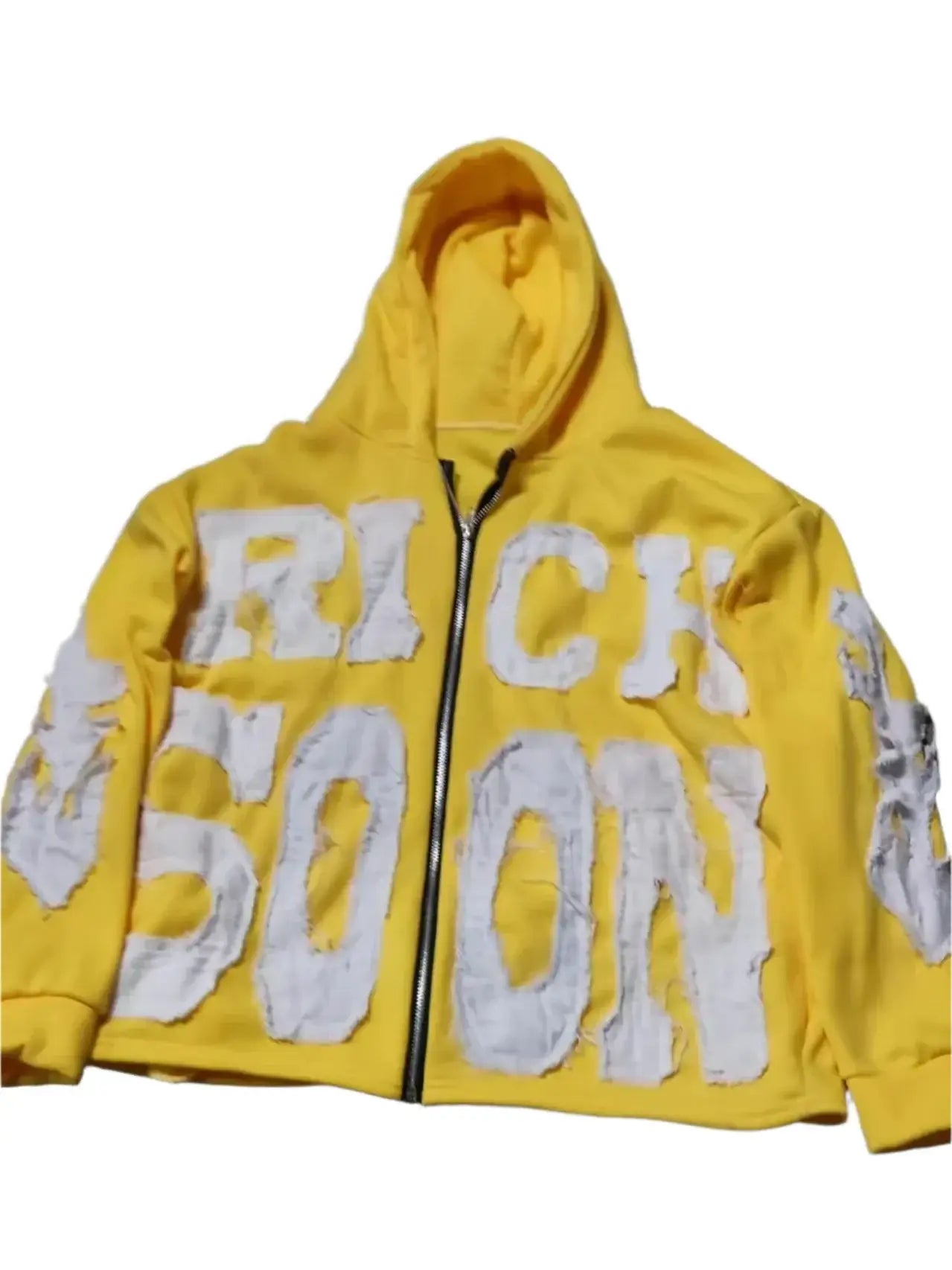 Yellow hooded jacket with RICK OWENS print showcasing bold Y2K design makes a statement