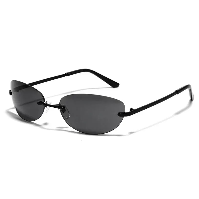 Sleek rimless sunglasses with dark lenses and thin black metal frames, perfect for Y2K style