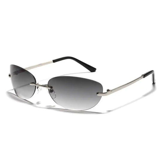 Rimless sunglasses with gradient gray lenses and thin metal frames, Y2K style