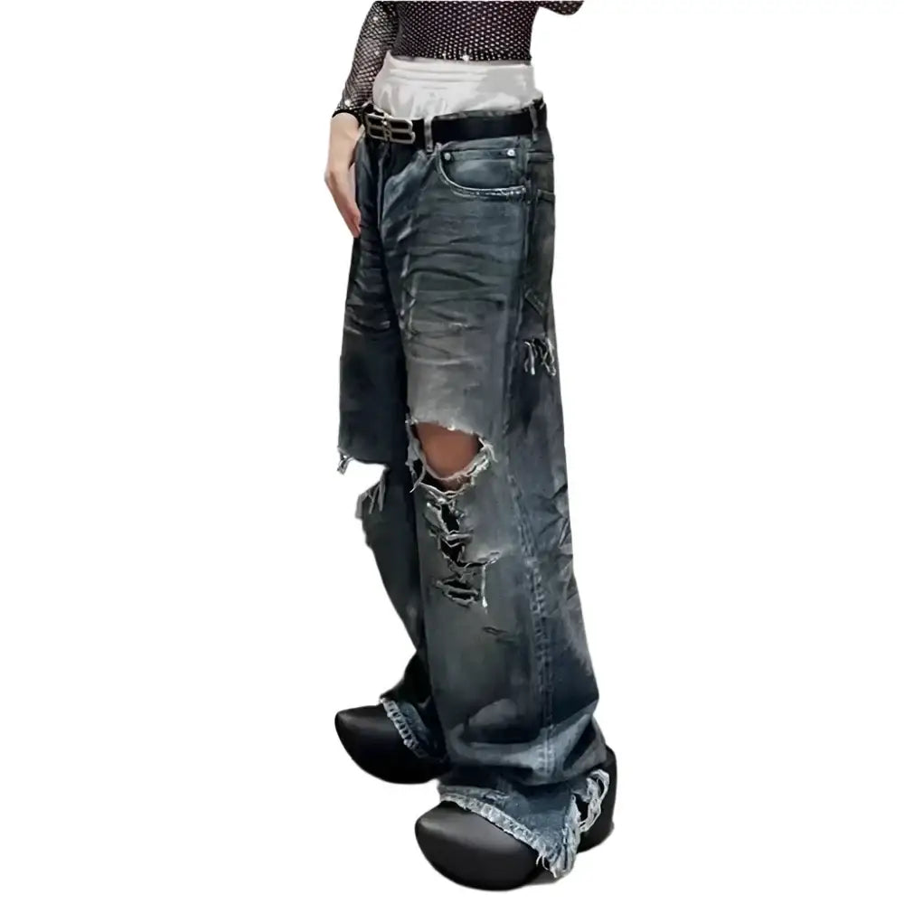 Distressed wide-leg Ripped Baggy Jeans featuring rips and frayed hems for a trendy look