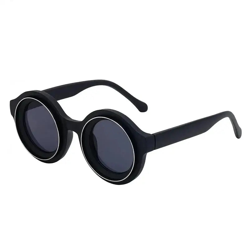 Round Steampunk Sunglasses with thick black frames and dark round lenses