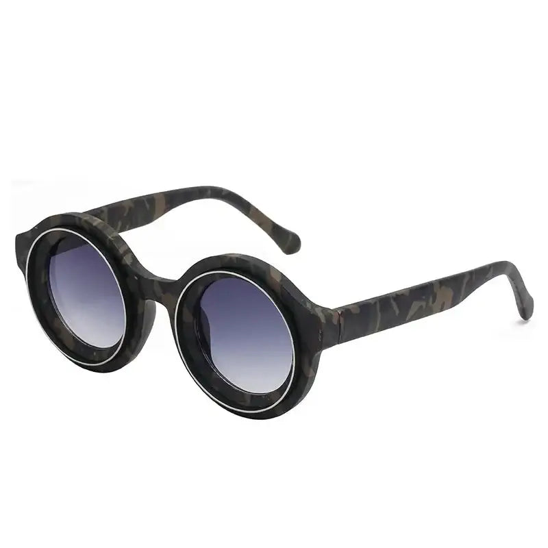 Round Steampunk Sunglasses featuring thick black frames and gradient lenses