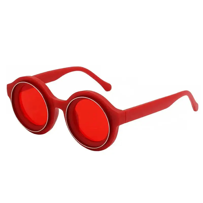 Round Steampunk Sunglasses featuring bold red frames and tinted lenses for a stylish look