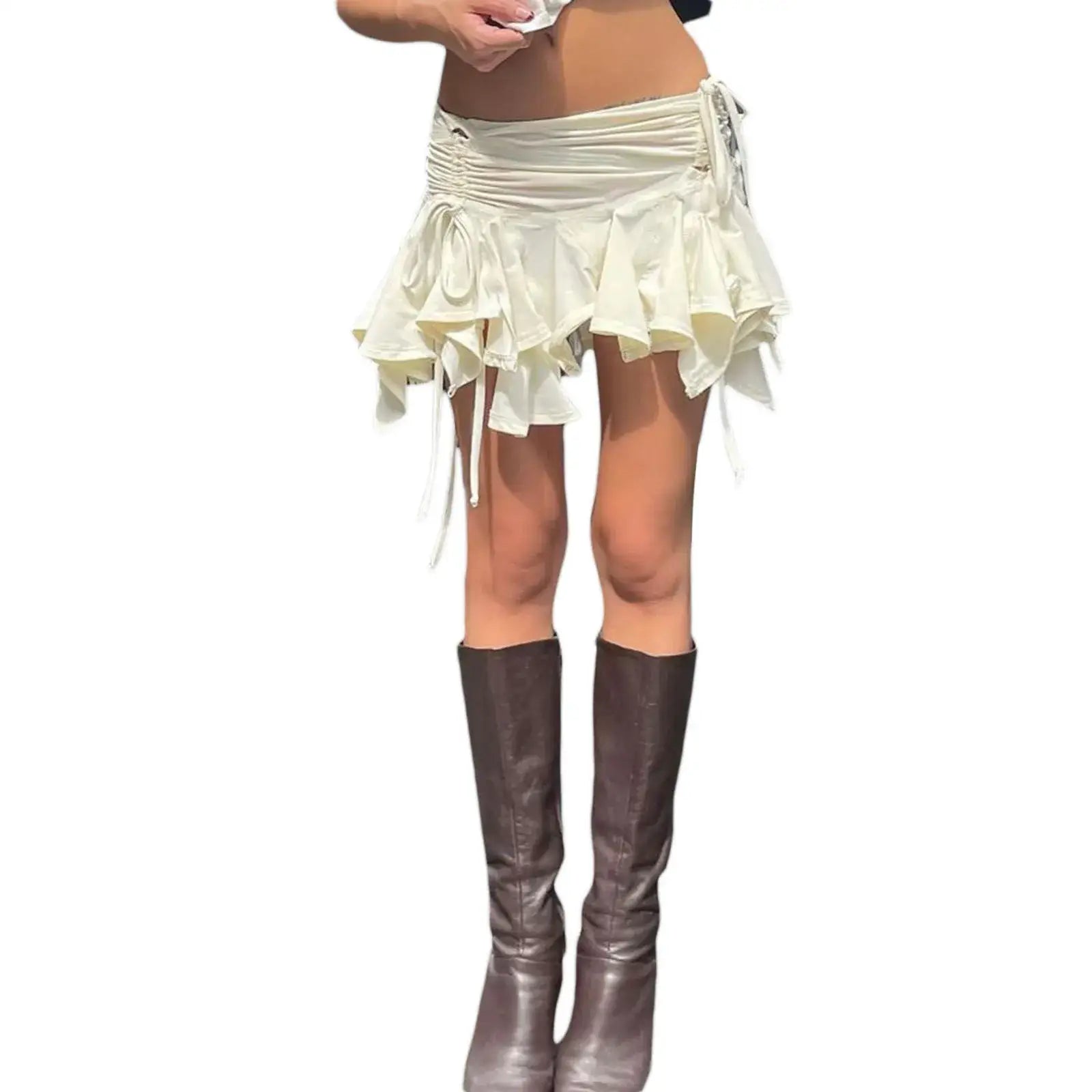 Ruffled mini skirt in cream with drawstring waist styled with brown knee-high boots