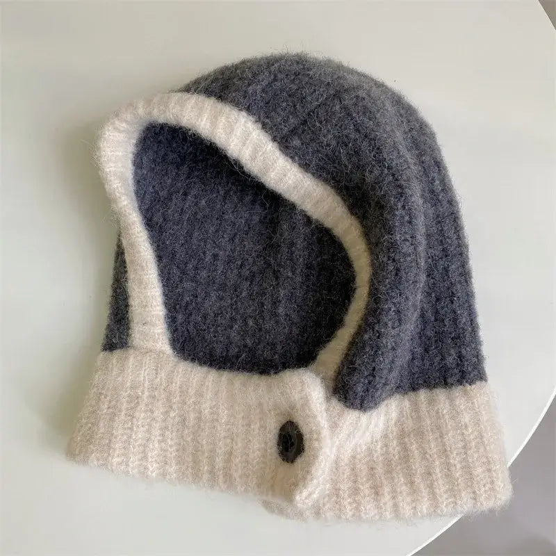 Knitted winter hat in gray and white design, part of the Scarf Balaclava collection