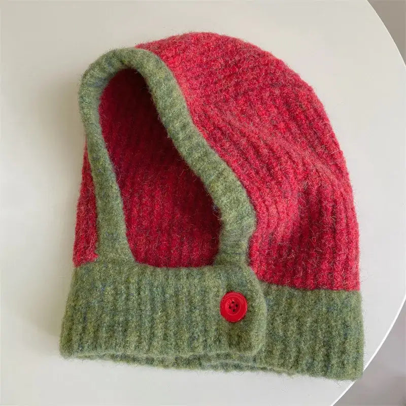 Knitted wool scarf balaclava hat with red top, green brim, and button accent