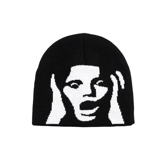 Black knit Scream Beanie featuring white graphic face design for a stylish Y2K look