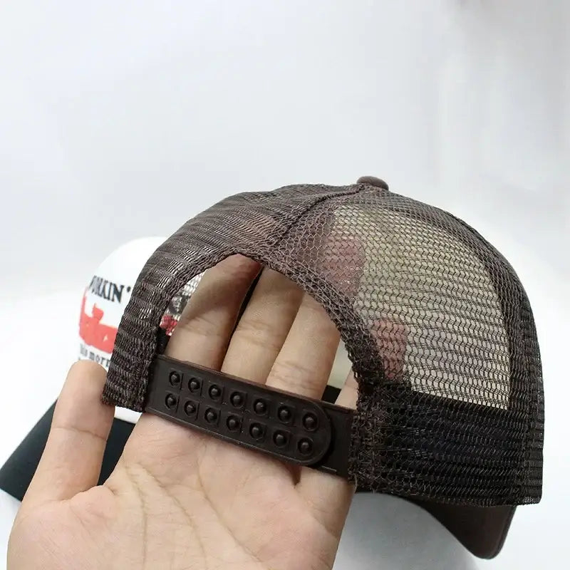 Mesh-backed trucker cap with adjustable snap closure, perfect Y2K Sicko Hat style